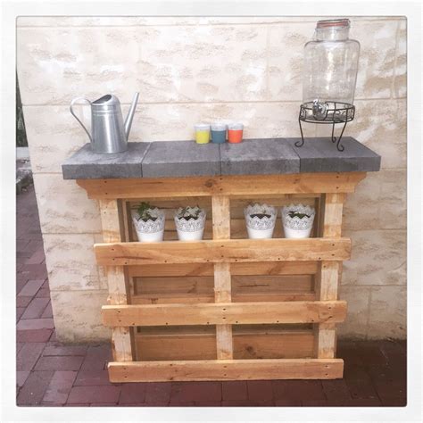 Pallet Bar Made From 2 Pallets And Pavers As A Top Pallet Bar Wall