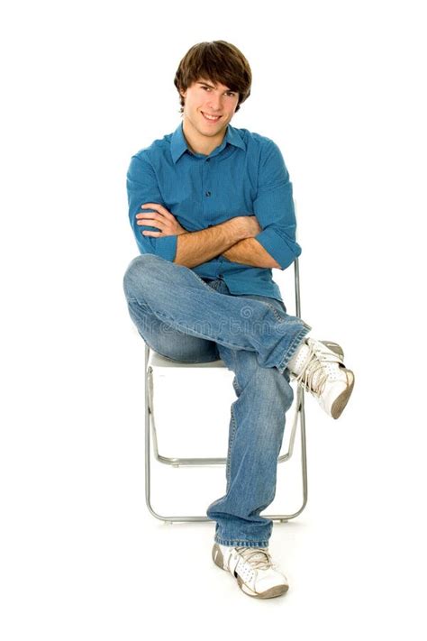 Young Man Sitting In Chair Stock Photos Image 12516953