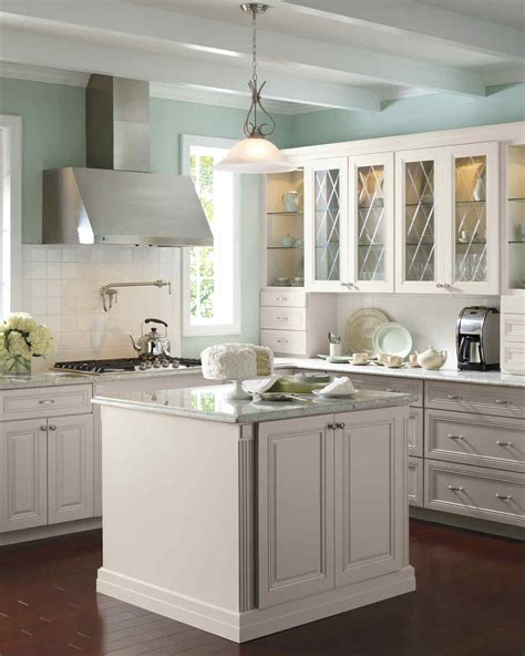 There are 32 styles of hardware to accompany the various cabinet styles, and complementing styles of corian countertop and wall paint. Select Your Kitchen Style | Martha Stewart
