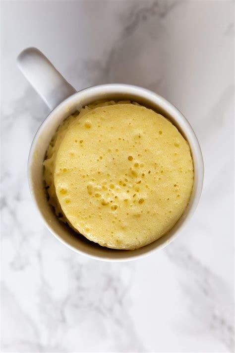 Healthy 1 minute low carb vanilla mug cake which is so fluffy, light and moist in the center! Easy Vanilla Mug Cake Recipe | Baked by an Introvert®