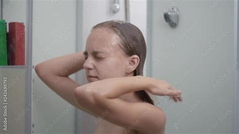 Smiling Young Girl Bathing Under A Shower At Home Beautiful Teen Girl Taking Shower And Washing