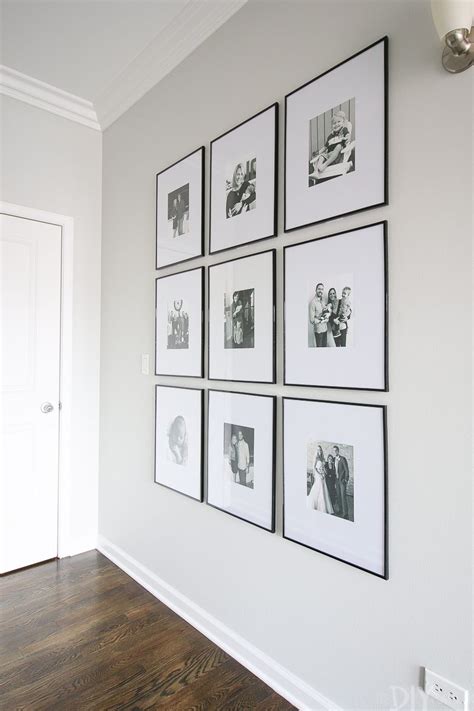 How To Hang A Symmetrical Gallery Wall In Your Hallway To Make A