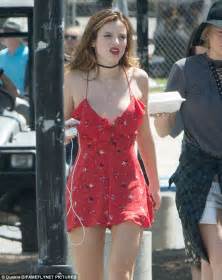 bella thorne dons cheeky daisy dukes before wowing in red on set of her new thriller you get me