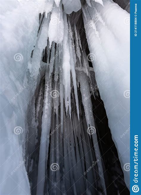 Ice Cave Icicles In The Rocky Caves Lake Baikal In Winter Siberia