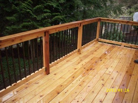 7 deck rail ideas for your cedar deck. Metal Deck Railing Systems | Second story cedar deck ...