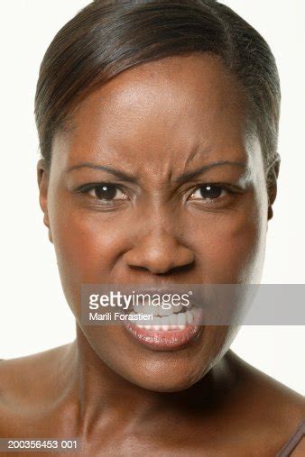 Young Woman Scowling Portrait Closeup High Res Stock Photo Getty Images