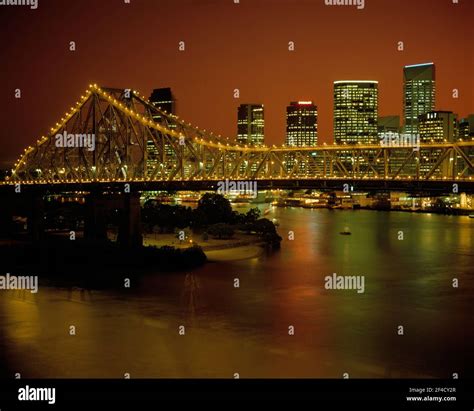 Australia Queensland Brisbane City Skyline And Story Bridge At Dusk