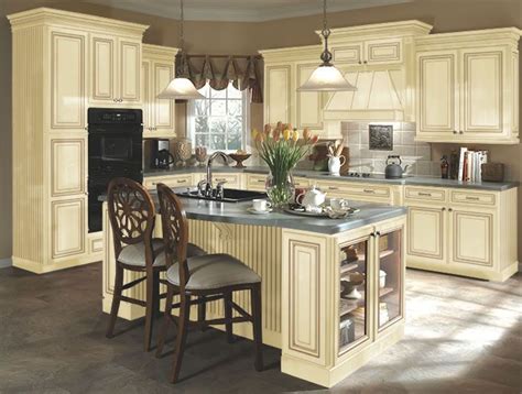 See more ideas about kitchen remodel, kitchen design, kitchen redo. Kitchen idea #3: distressed cream cabinets, this has tile but I would do a very dark stain wood ...