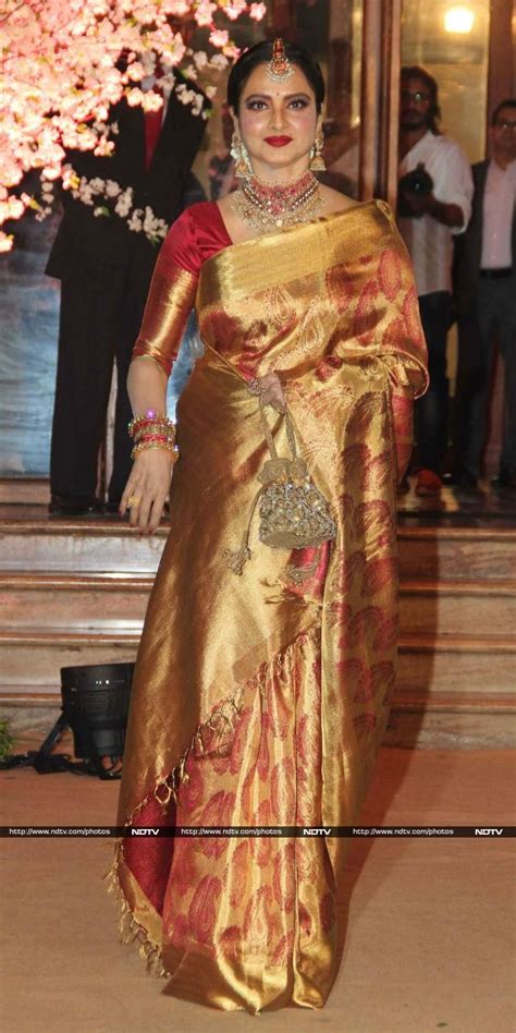 Actress Rekha Dressed In Her Usual Kanjivaram Sari Glittered At The Do Stylish Sarees
