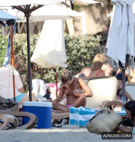 Amelia Windsor Topless While Reading A Book And Sunbathing
