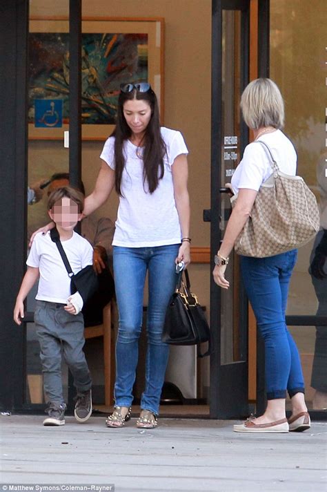 Check spelling or type a new query. Erica Packer holds on tightly to son Jackson as he wears ...