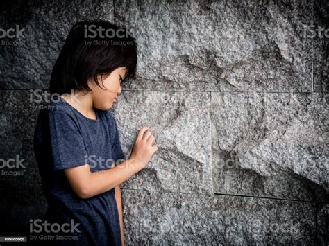 Little Boy Unhappy Sad And Stress Alone Stock Photo Download Image