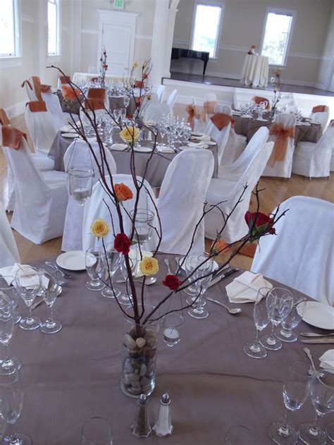 Fall Themed Centerpieces With Ranunculus On Birch Floral Centerpieces