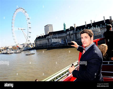 Jason Biggs Takes Photos Of The London Eye While On An Open Top Bus To Promote His New Film