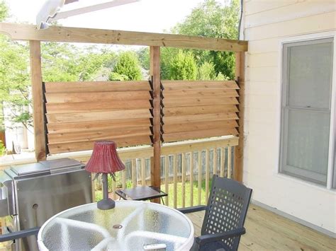 You need to try this gabion privacy fence idea. DIY Simple Louvered Privacy Fence for Deck / Patio in your Backyard | Deck railings, Patio ...