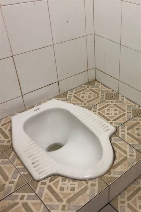 How To Use A Squat Toilet In China Chinese Toilets