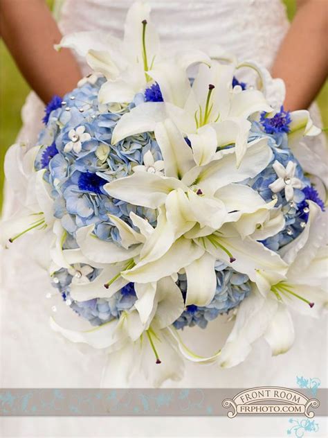 Here is a list of trending blue wedding flowers you should consider. Maggie's bridal bouquet of white lilies and blue ...