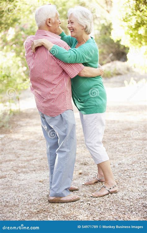 senior couple dancing in countryside together stock image image of summer female 54971789