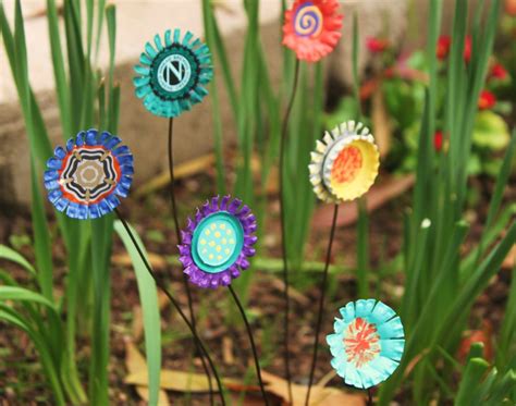 I wondered recently if there were perhaps more things that i could add than what i take an old watering can and turn it into a beautiful garden decoration with some crystals. 15 Decorative DIY Accents That Will Make Your Garden Stand Out