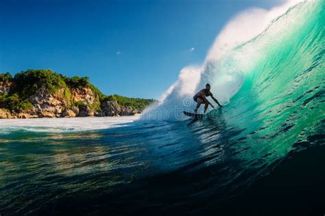 July 12 2020 Bali Indonesia Surfer On Surfboard At Barrel Wave