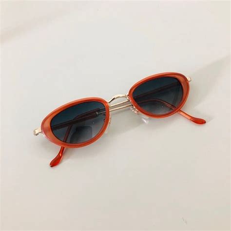 vintage 90s oval sunglasses bronze frame brown lens deadstock