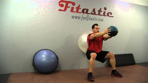 Swiss Ball Wall Squat To Medicine Ball Front Shoulder Raise Youtube