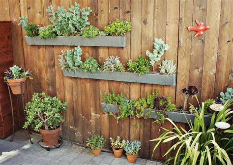 This vertical garden planter idea provides a space for growing fresh herbs, plus a shelf. Vertical Garden DIY - Numi Tea Garden Blog