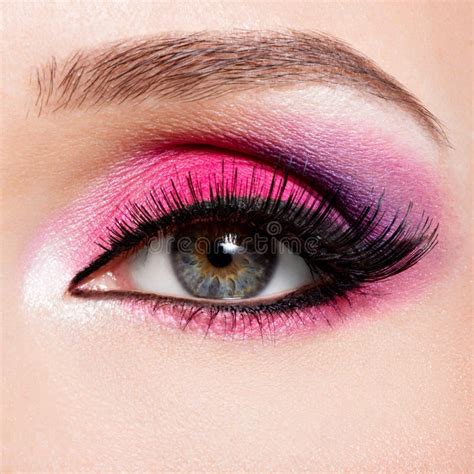 Female Eye With Beautiful Fashion Bright Pink Makeup Stock Image