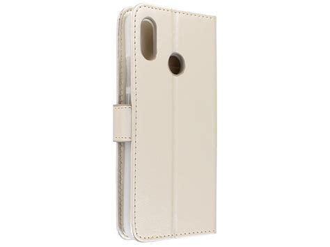 Official announcement date is march 2018. Bookcase Wallet Goud | Huawei P20 Lite hoesje