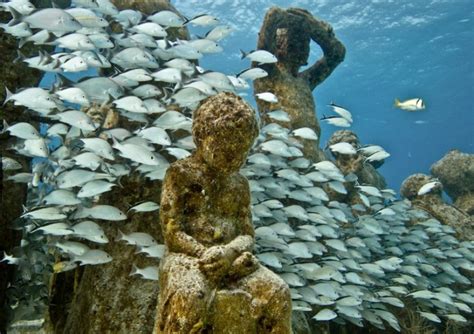 Underwater Sculptures Both Protect And Become Coral Reefs
