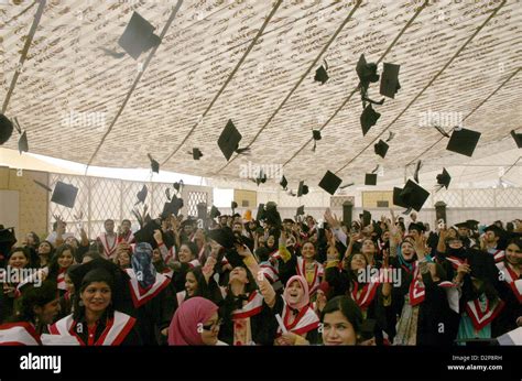 Students Of Karachi University Throwing Their Hats In Air To Celebrate