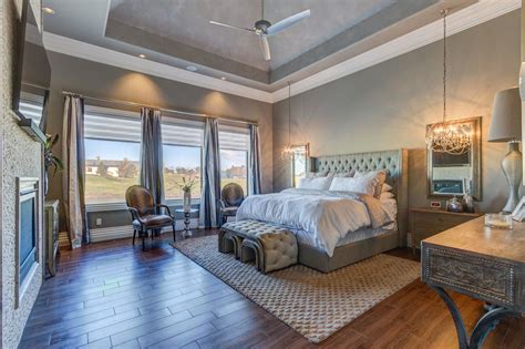 These bedrooms require their own bathrooms with. Master Bedroom with metal fireplace & Crown molding in ...