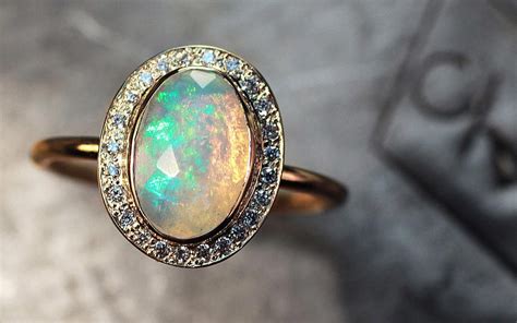1 Carat Opal Ring With Diamond Halo Chinchar Maloney