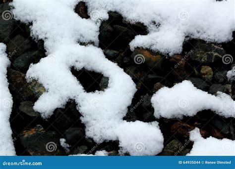 Melting Snow On Rocks Stock Photo Image Of Ground Cold 64935044