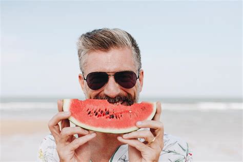 Woman Eating Watermelon At The Beach Free Stock Photo 418093