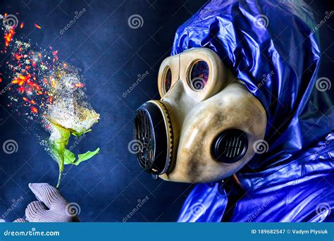 Man In The Gas Mask Holding A Burning Flower Radiation Influence