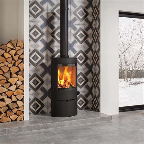 In our case, we've decided to go through the wall for simplicity's sake. Can I Use Tiles Around My Wood Burner? - Walls and Floors