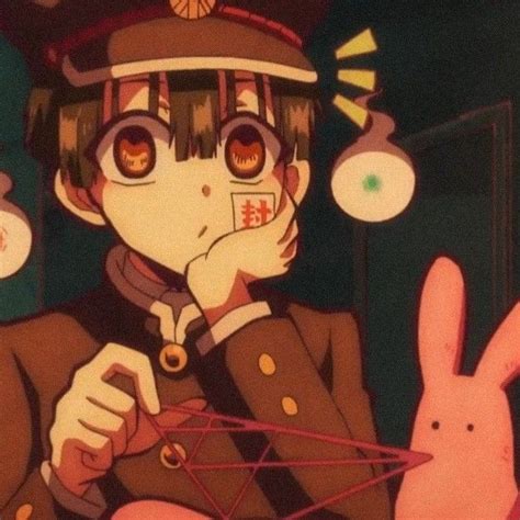 An Anime Character With Bunny Ears Holding Something In His Hand