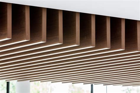 Vp Vertical Metal Baffles With A Us Walnut Finish Timber Ceiling