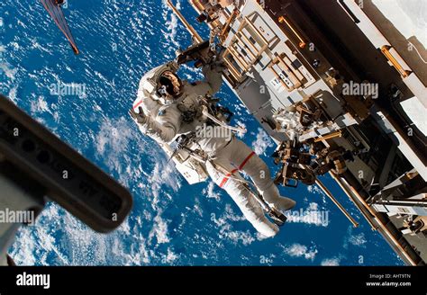 Astronaut Making Spacecraft Repairs Stock Photo Alamy