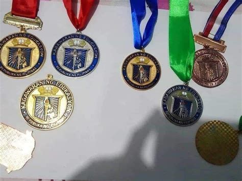 Kagawaran Medals Deped Medals Recognition Medaks Book And Torch Medal