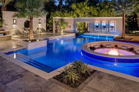 Tropical Pool With Sunken Fire Pit Seating Area Backyard Pool