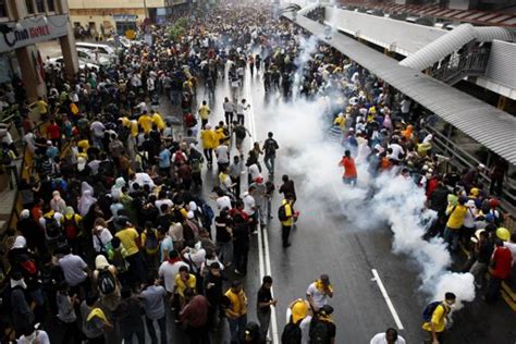 Malaysian Authorities Fire Tear Gas Detain At Least 672 At Biggest