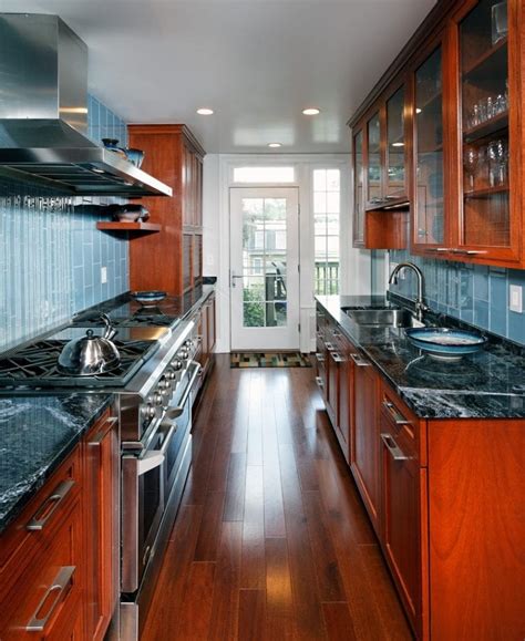 Most kitchen base cabinets lack vertical storage space for big, flat cookware like cookie sheets and pizza pans. 12 Amazing Galley Kitchen Design Ideas and Layouts