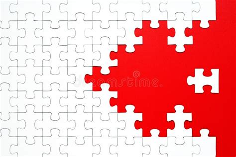 White Puzzle Pieces On A Red Background Separated Stock Image Image