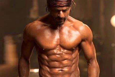 shah rukh khan looks smoking hot in shirtless avatar flaunts his 8 pack abs in first pathaan
