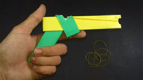 Go and put a gun on the paper plane you just made! Paper Gun - How To Make a Paper Gun That Shoots|Origami ...