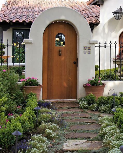 Massive grand entrance that is two stories in height. Spanish Gate Carmel | Spanish style homes, Spanish style ...