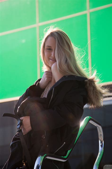model women hair in face smiling blonde long hair payton demilo zishy black jackets