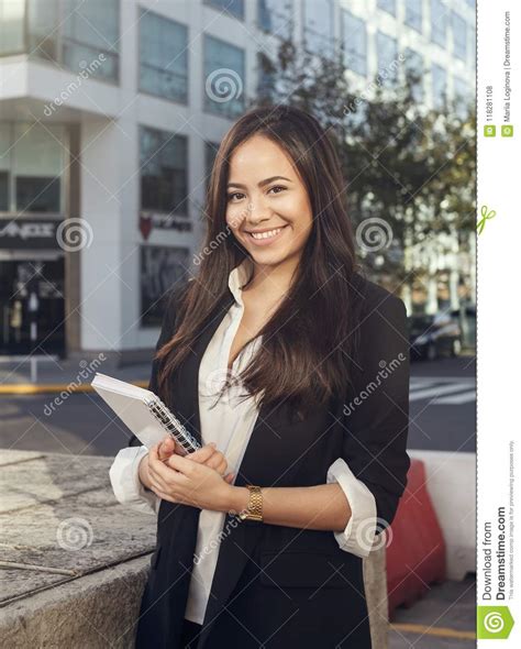 Beautiful Hispanic Young Business Woman Smiling At Camera